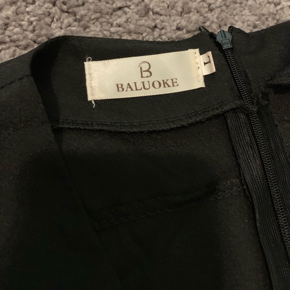 Black fitted romper with sheer sleeves - Picture 4 of 5